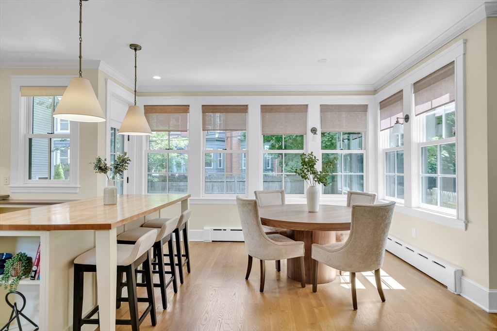 2 Percy Place Cambridge, MA 02139 - Photo 9 of 37 a dining room with furniture window and wooden floor