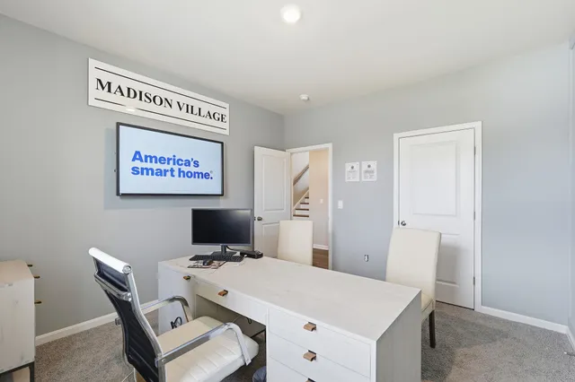 a workspace with furniture and a table