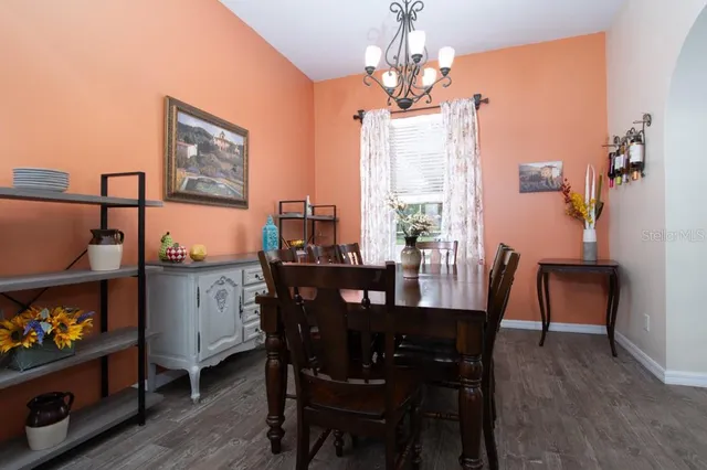 a bathroom with sink bathtub and window