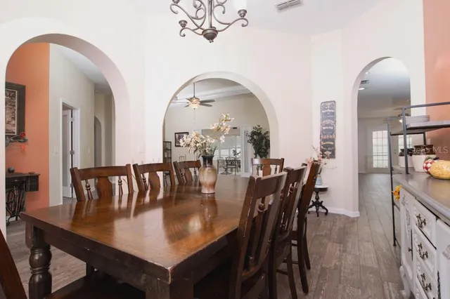 a spacious bathroom with a double vanity sink mirror and shower