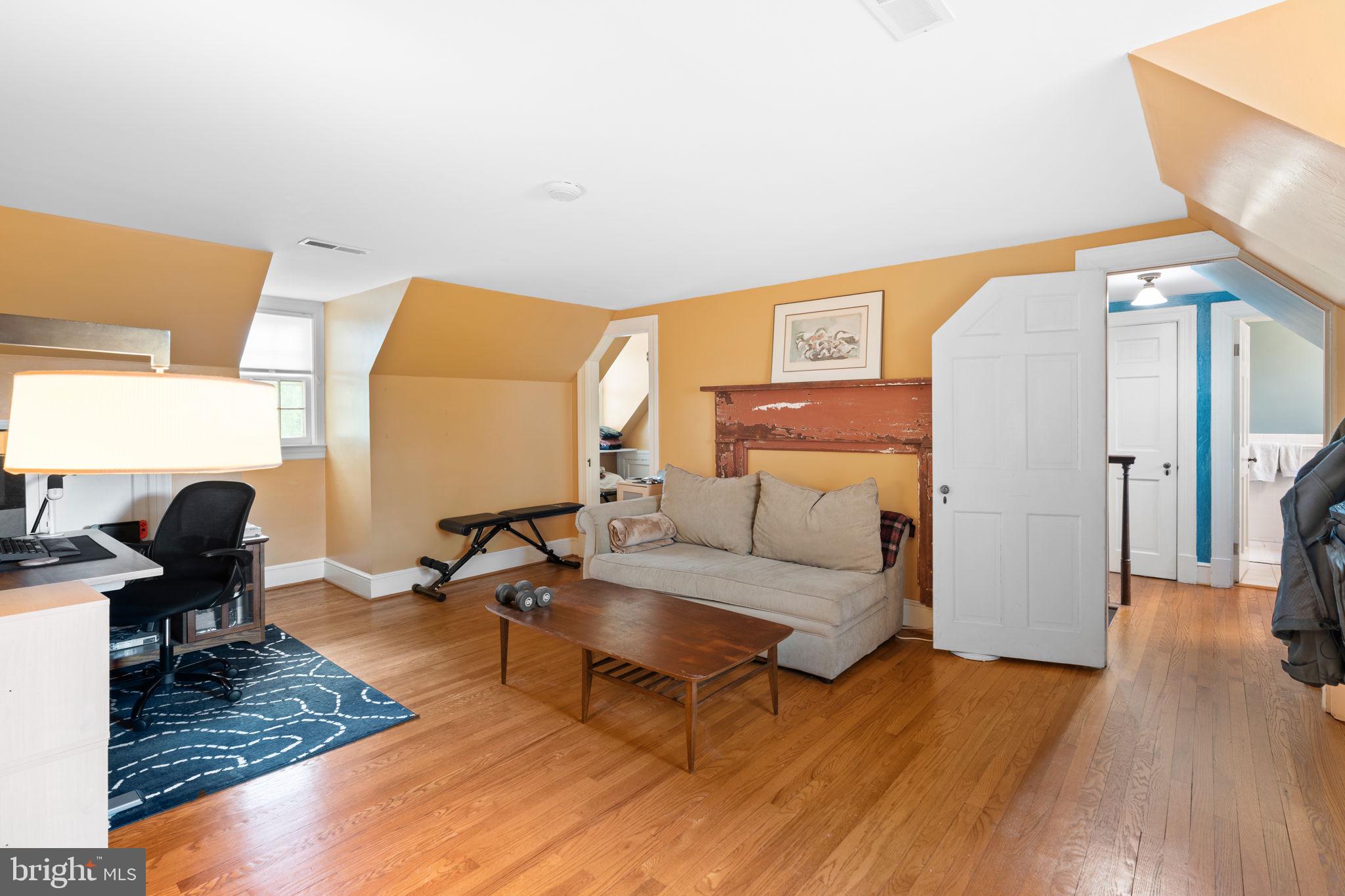 324 North Blue Ridge Turnpike Madison, VA 22727 - Photo 26 of 75 a living room with furniture and wooden floor