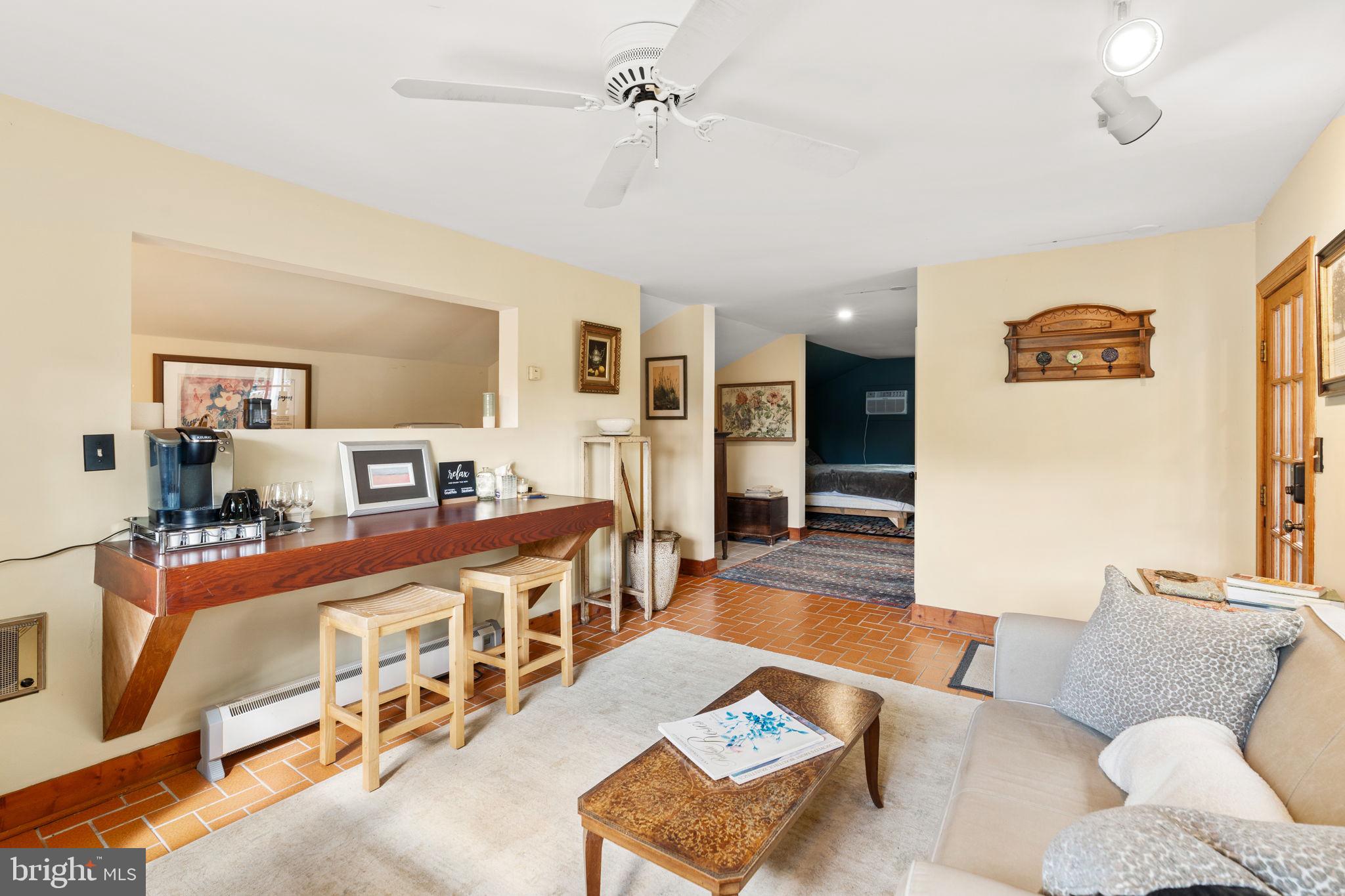 324 North Blue Ridge Turnpike Madison, VA 22727 - Photo 46 of 75 a living room with furniture and a wooden floor