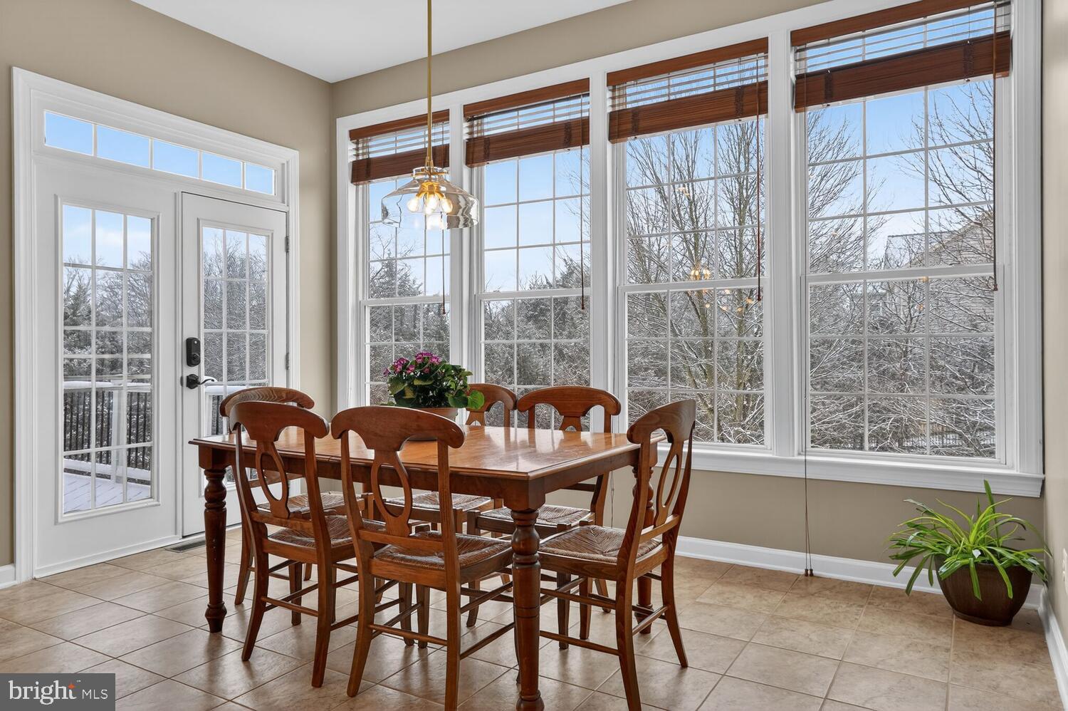 43024 La Riva Drive Ashburn, VA 20148 - Photo 16 of 63 a dining room with furniture window and outside view