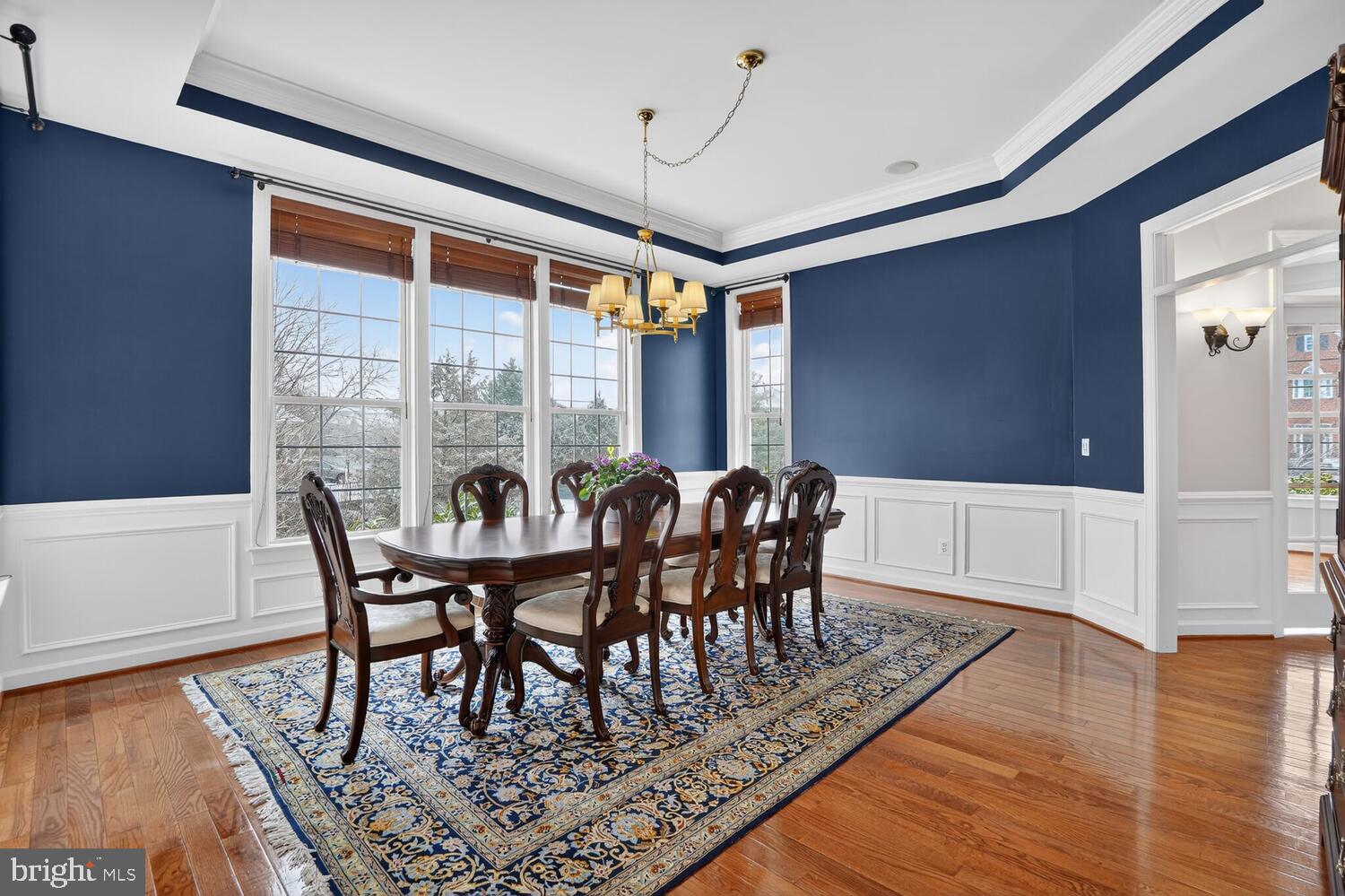 43024 La Riva Drive Ashburn, VA 20148 - Photo 20 of 63 a view of a dining room with furniture window and wooden floor