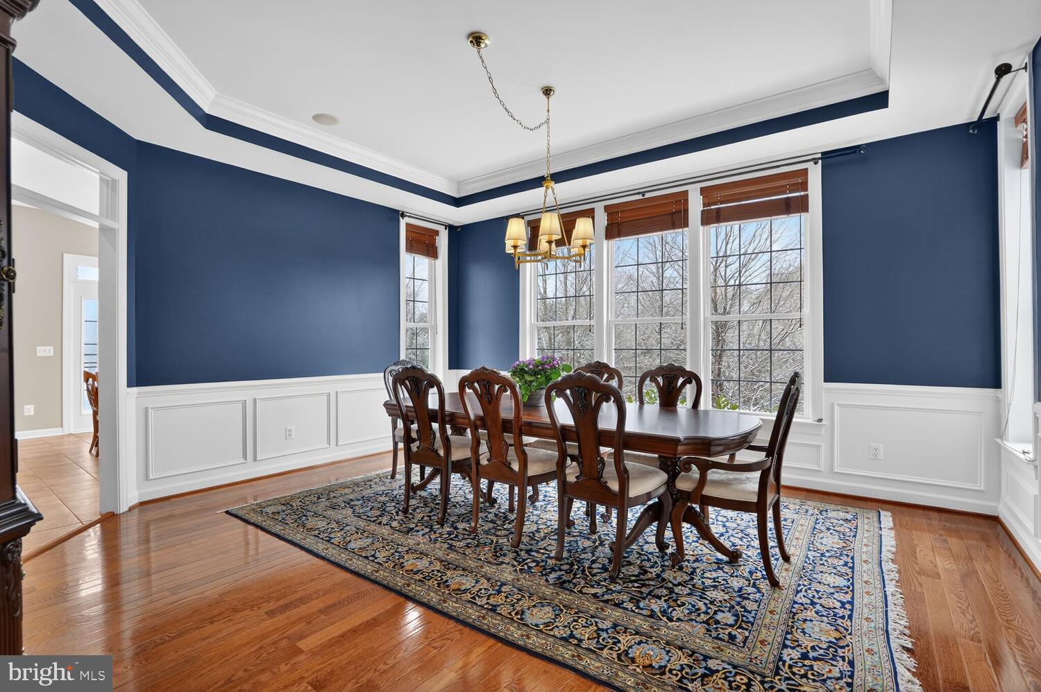 43024 La Riva Drive Ashburn, VA 20148 - Photo 21 of 63 a view of a dining room with furniture window and wooden floor