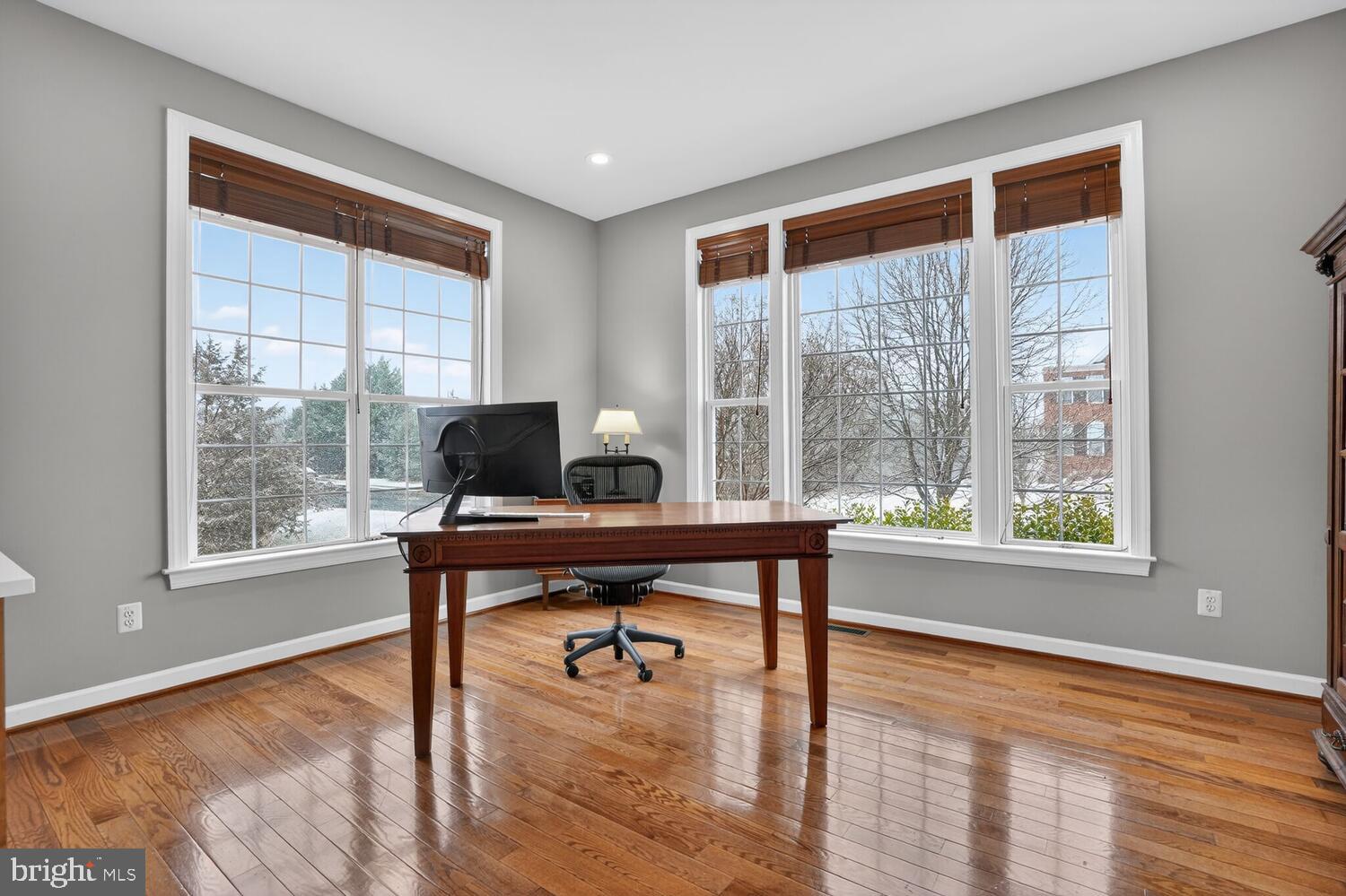 43024 La Riva Drive Ashburn, VA 20148 - Photo 22 of 63 a view of a workspace with wooden floor and a window