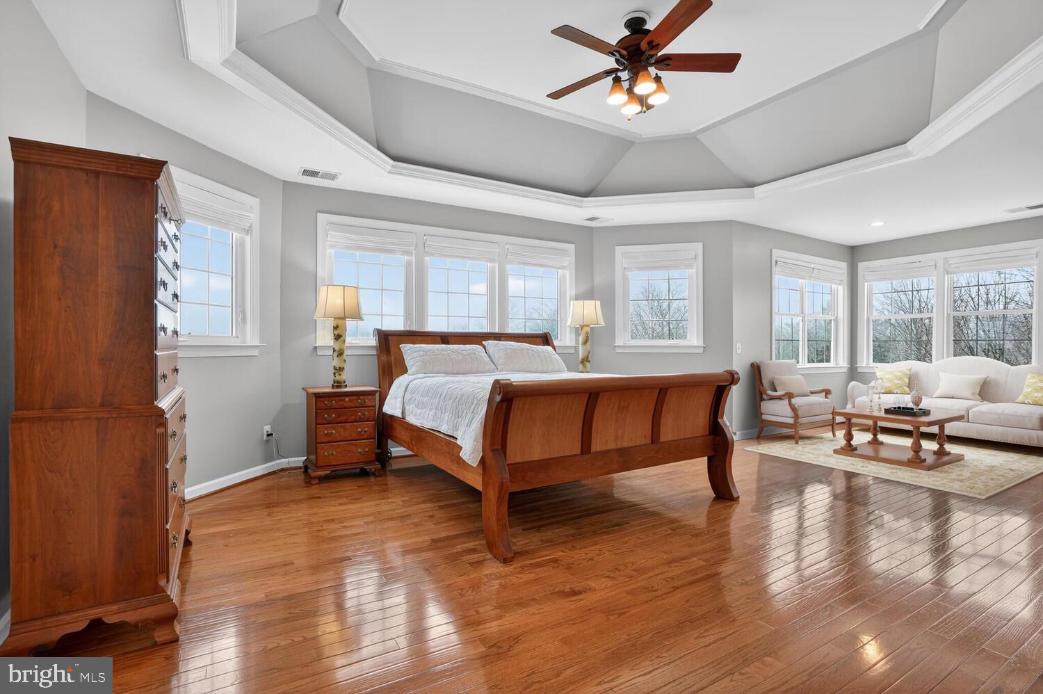 43024 La Riva Drive Ashburn, VA 20148 - Photo 31 of 63 a bedroom with a bed couch and a window