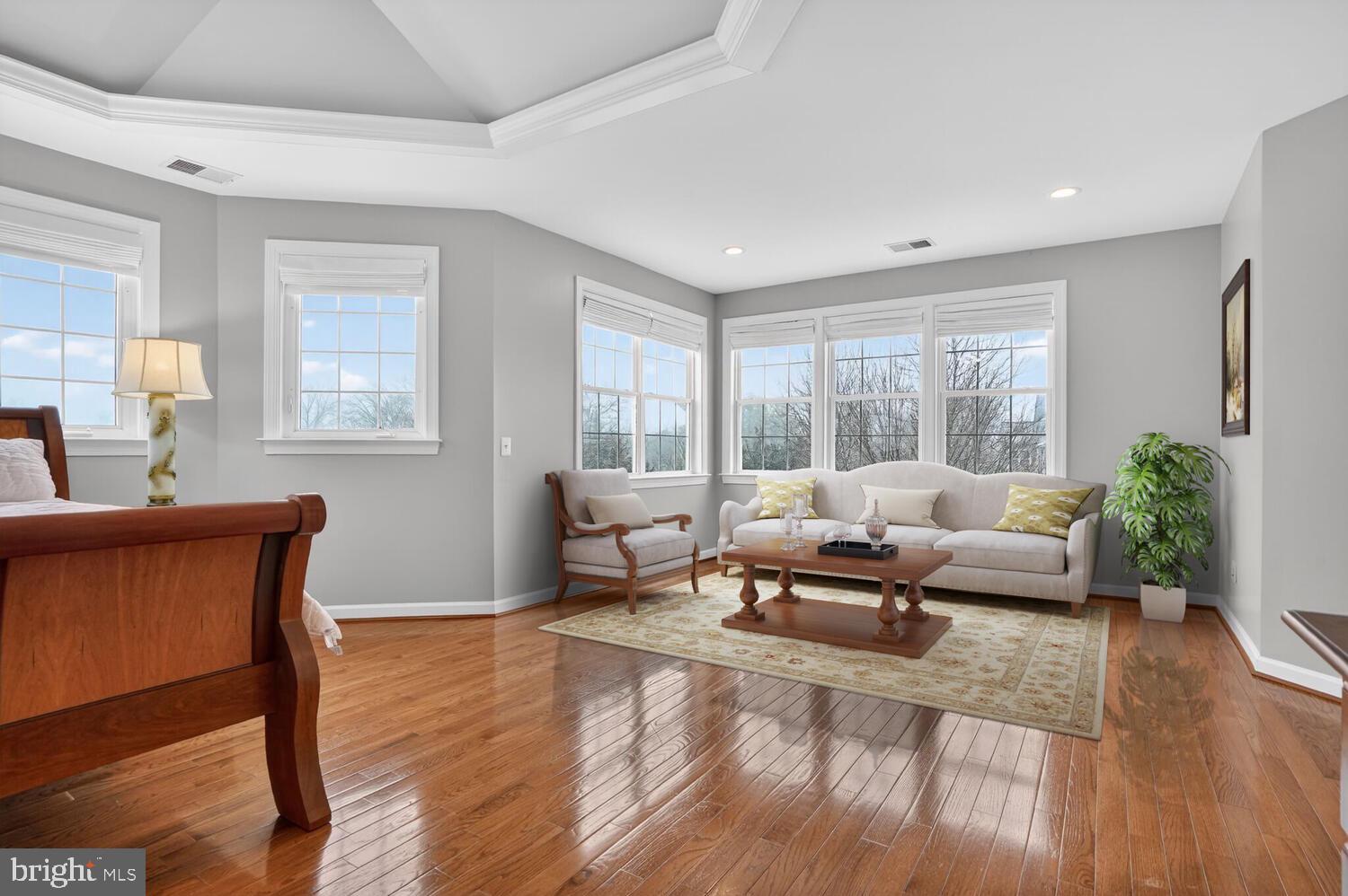 43024 La Riva Drive Ashburn, VA 20148 - Photo 33 of 63 a living room with furniture and a large window