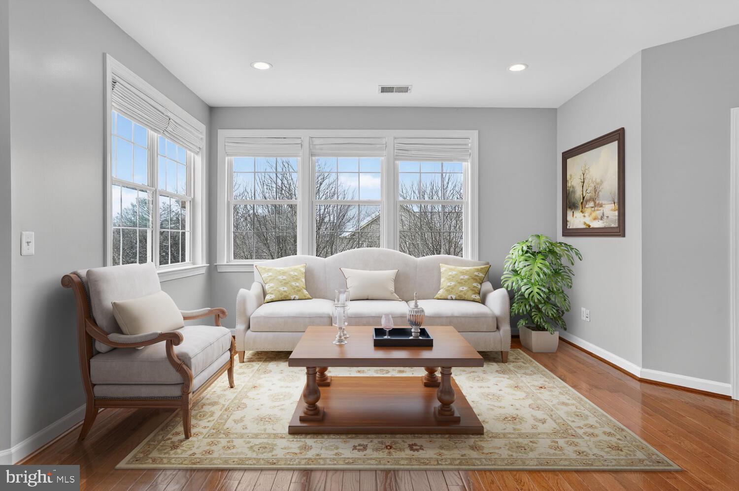 43024 La Riva Drive Ashburn, VA 20148 - Photo 34 of 63 a living room with furniture and a large window