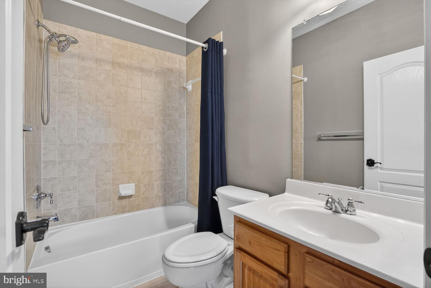 43024 La Riva Drive Ashburn, VA 20148 - Photo 44 of 63 a bathroom with a sink toilet and shower