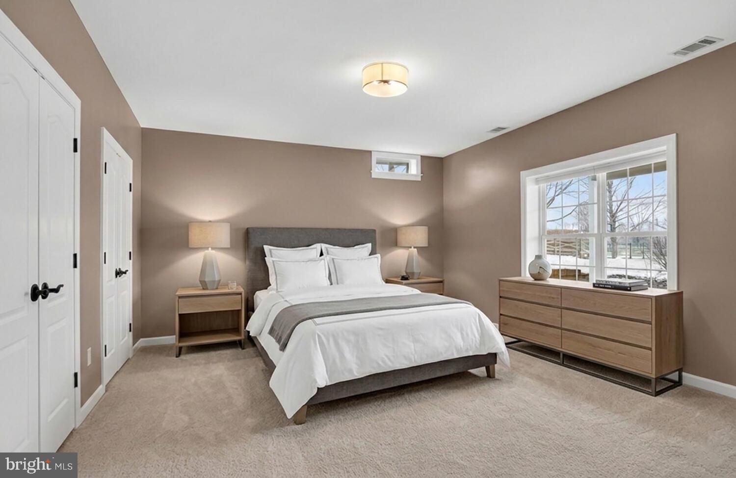 43024 La Riva Drive Ashburn, VA 20148 - Photo 51 of 63 a bedroom with a bed and a window