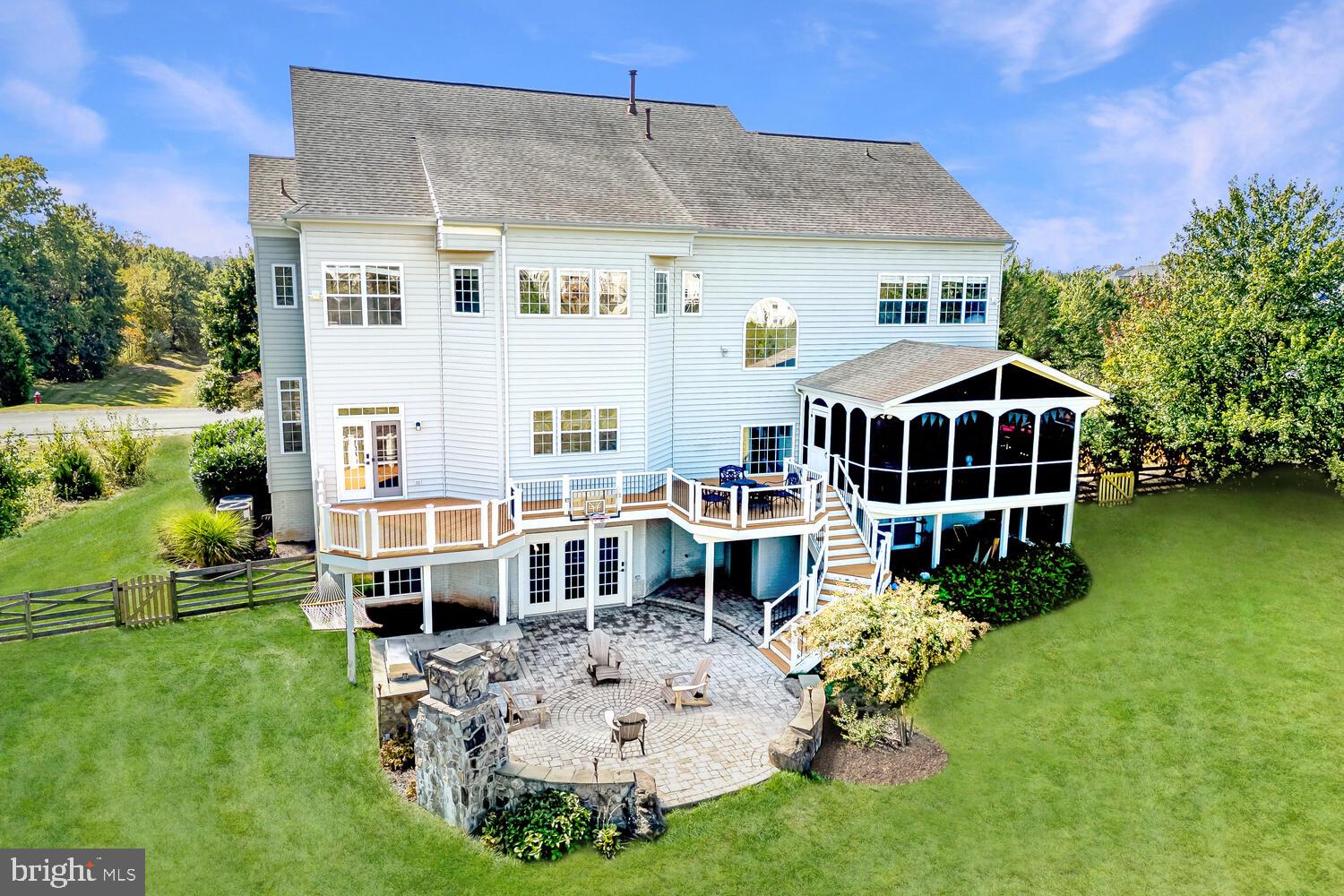 43024 La Riva Drive Ashburn, VA 20148 - Photo 6 of 63 a aerial view of a house with a yard table and chairs