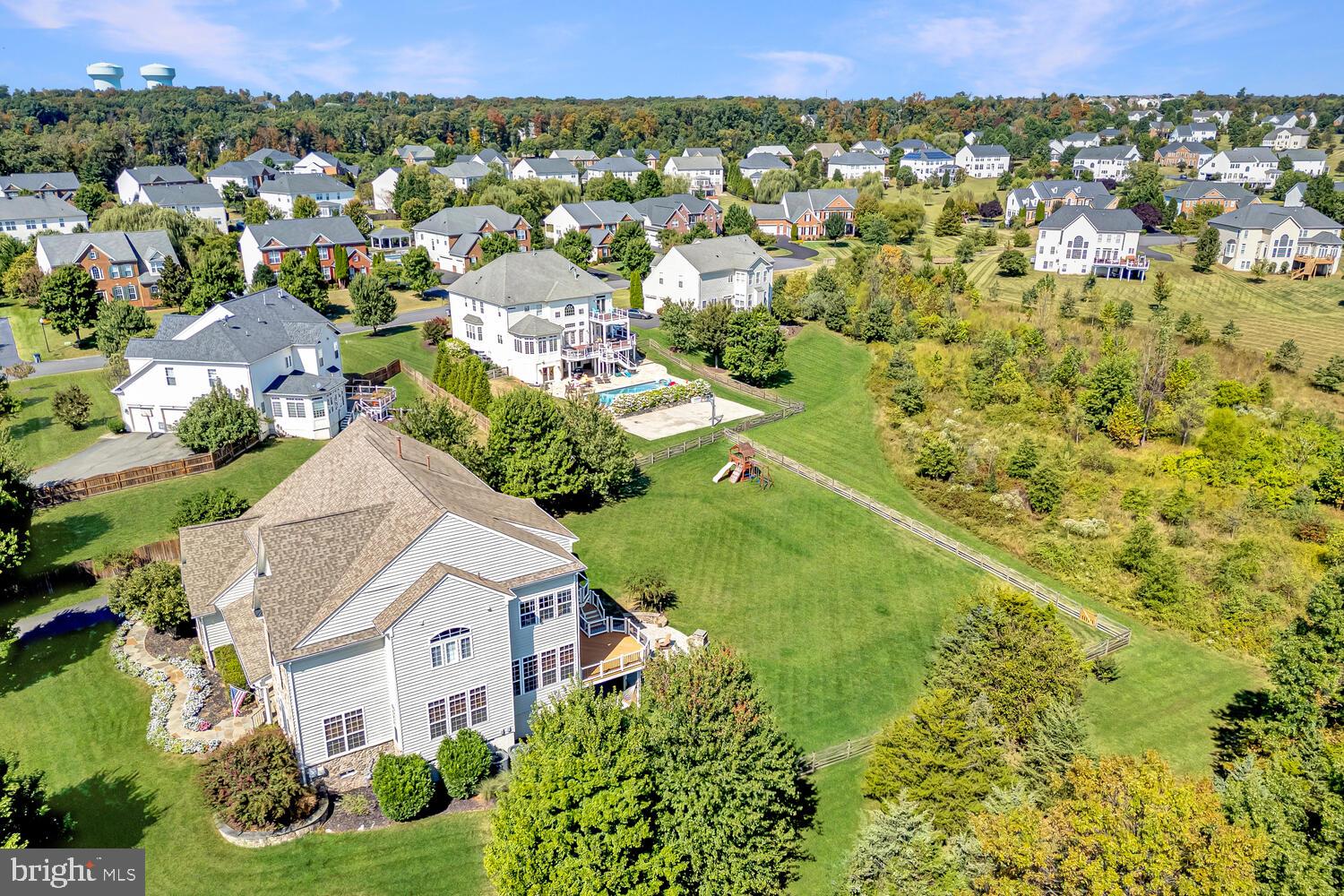 43024 La Riva Drive Ashburn, VA 20148 - Photo 62 of 63 an aerial view of residential houses with outdoor space and trees