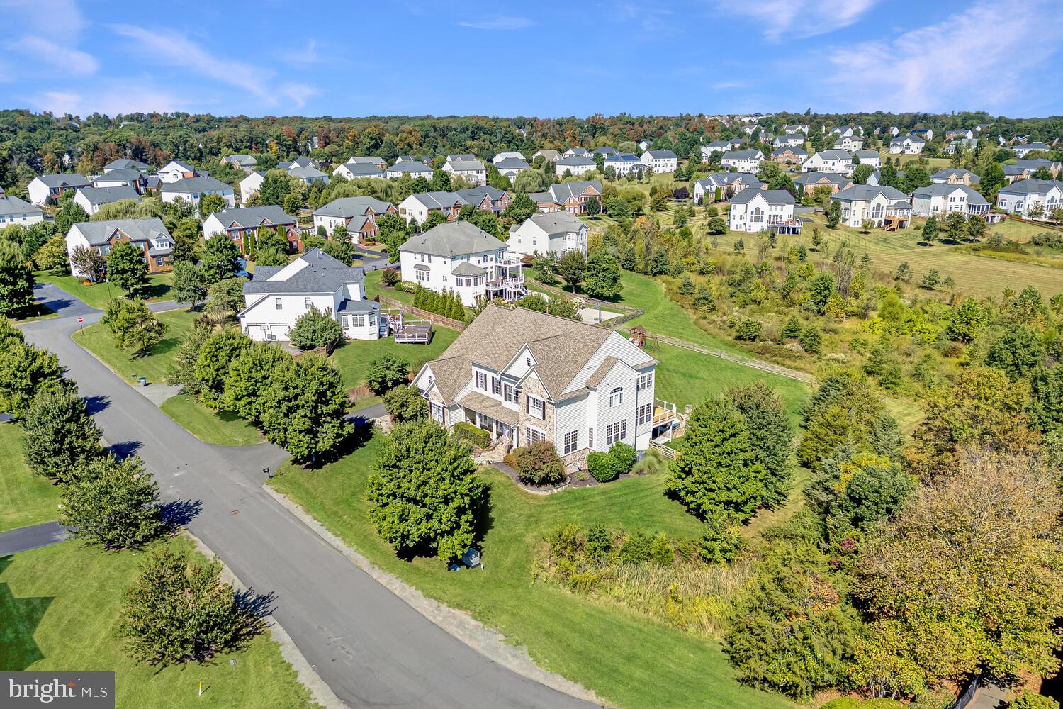 43024 La Riva Drive Ashburn, VA 20148 - Photo 63 of 63 an aerial view of residential houses with outdoor space and trees
