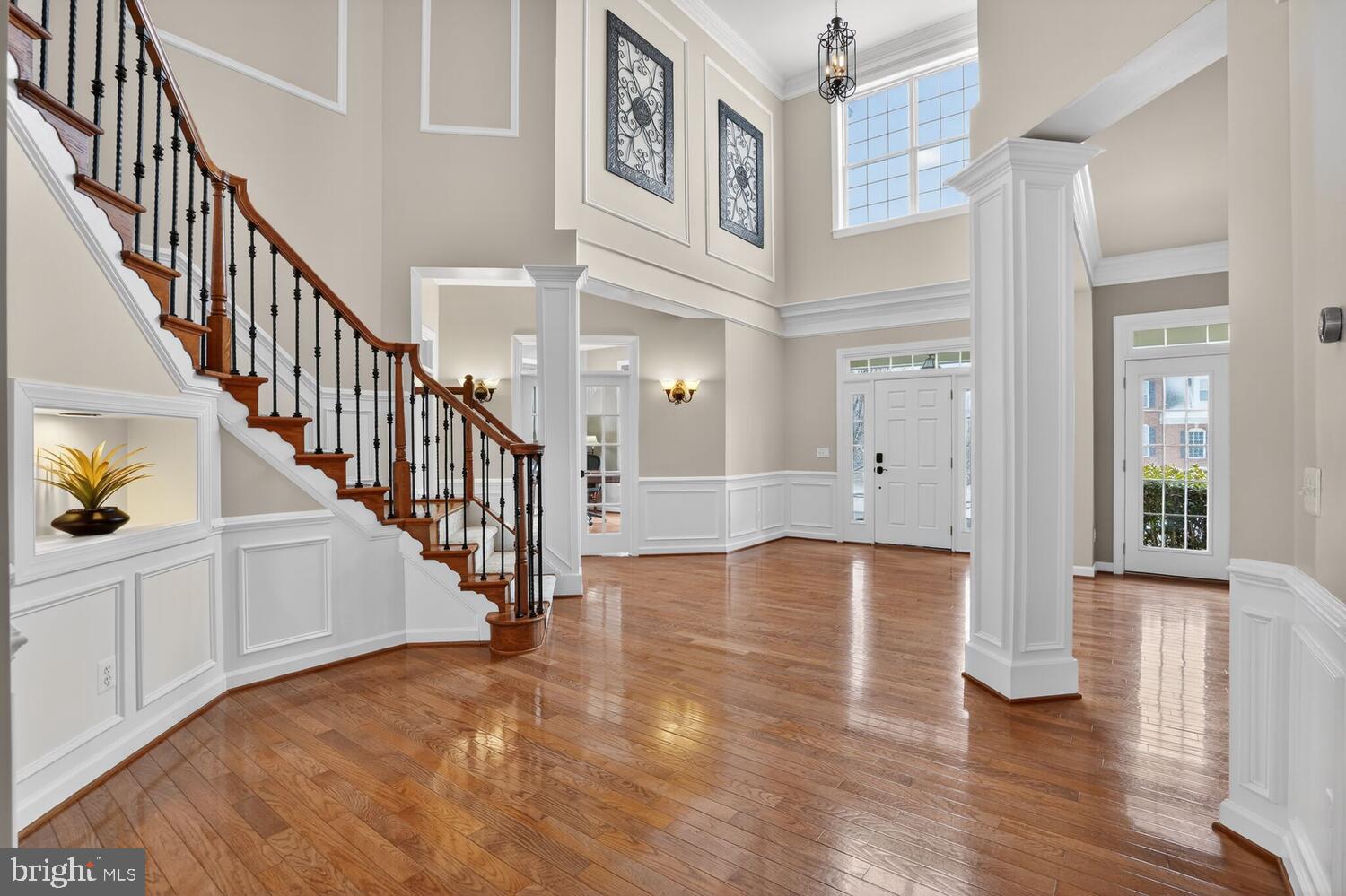 43024 La Riva Drive Ashburn, VA 20148 - Photo 7 of 63 a view of an entryway with wooden floor