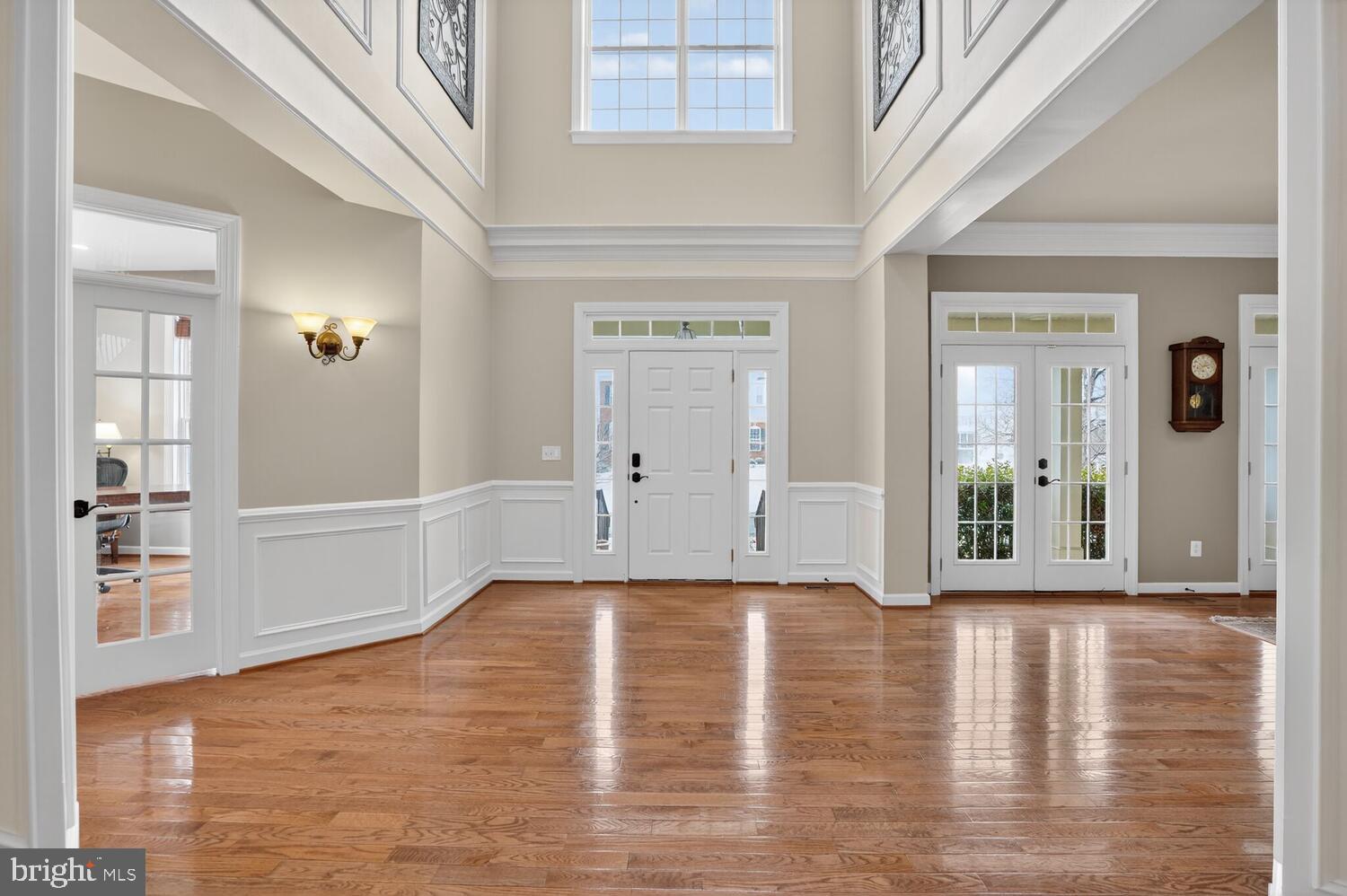 43024 La Riva Drive Ashburn, VA 20148 - Photo 8 of 63 a view of an empty room with wooden floor