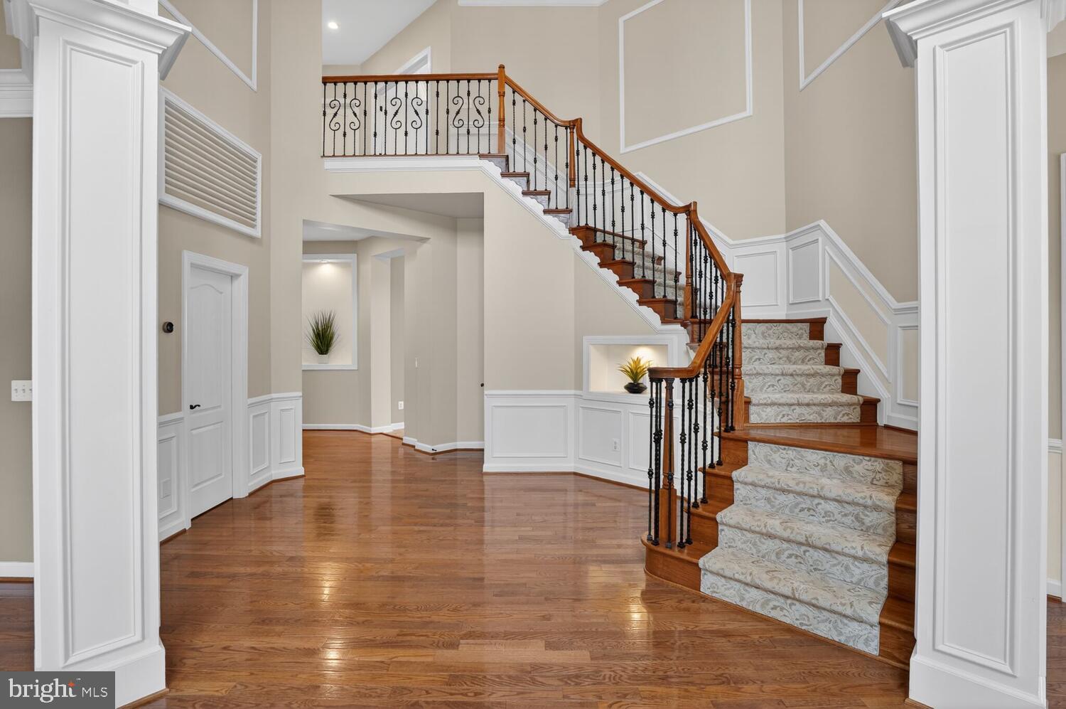 43024 La Riva Drive Ashburn, VA 20148 - Photo 9 of 63 a view of entryway and hall with wooden floor