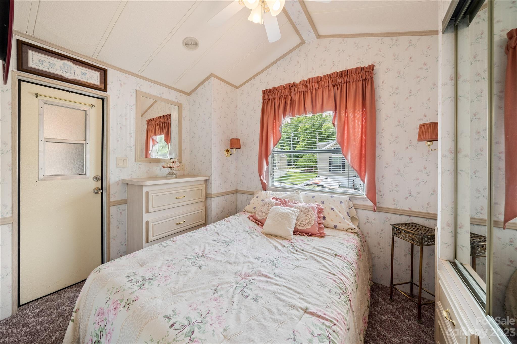 230 Pike Point Waynesville, NC 28785 - Photo 20 of 30 a bedroom with a bed and a window