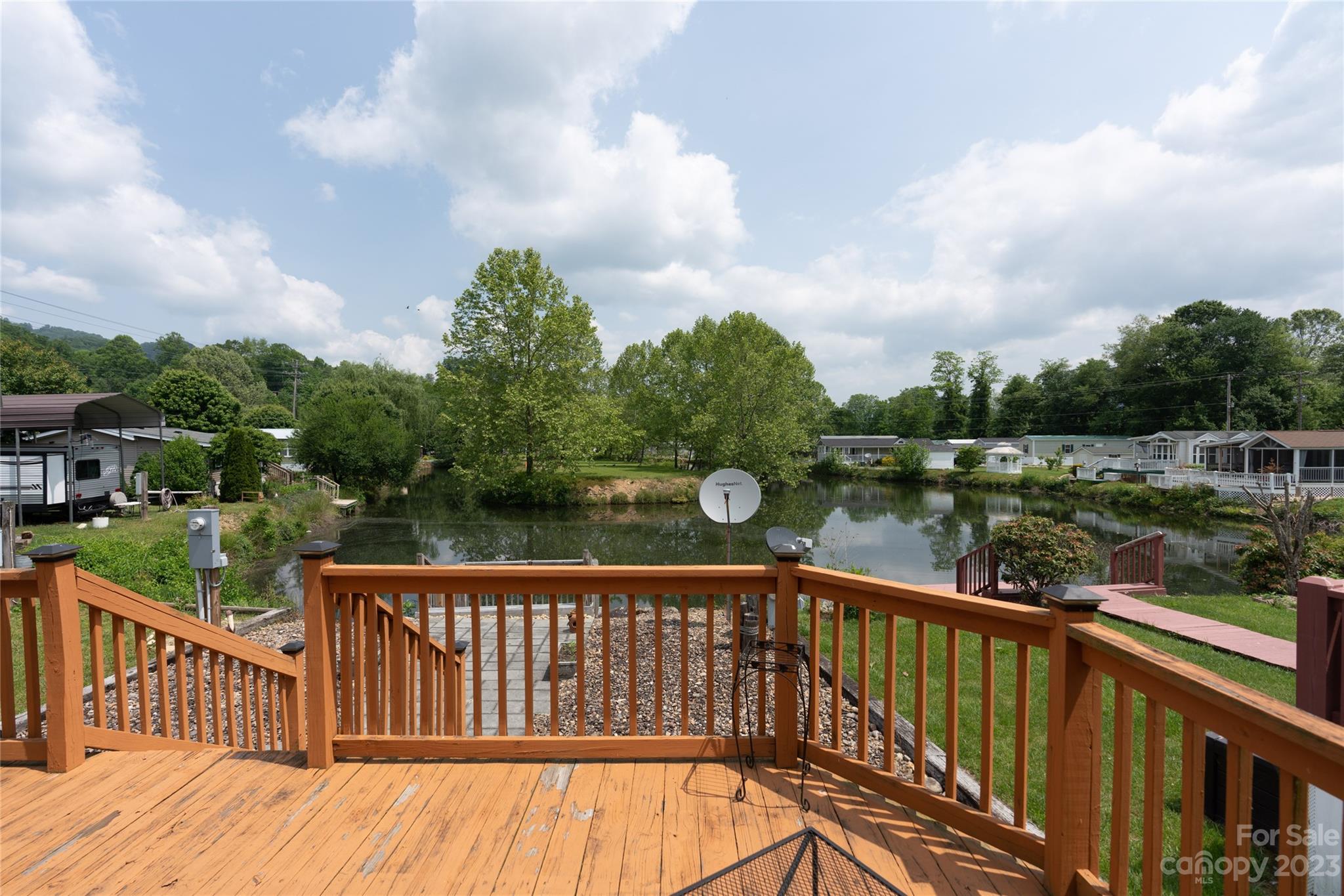 230 Pike Point Waynesville, NC 28785 - Photo 26 of 30 a view of a balcony with wooden floor & fence