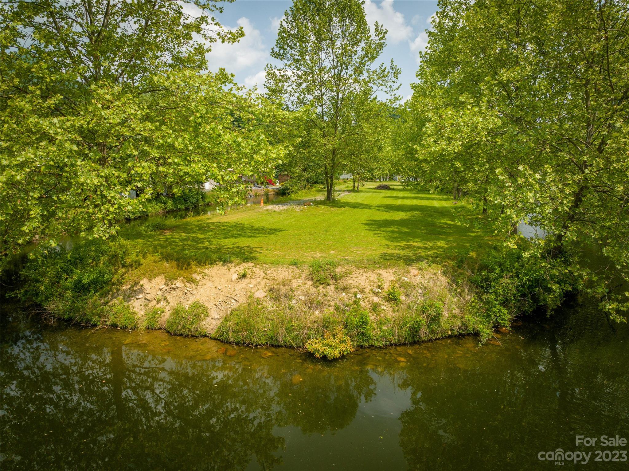 230 Pike Point Waynesville, NC 28785 - Photo 28 of 30 a view of a lake with a big yard