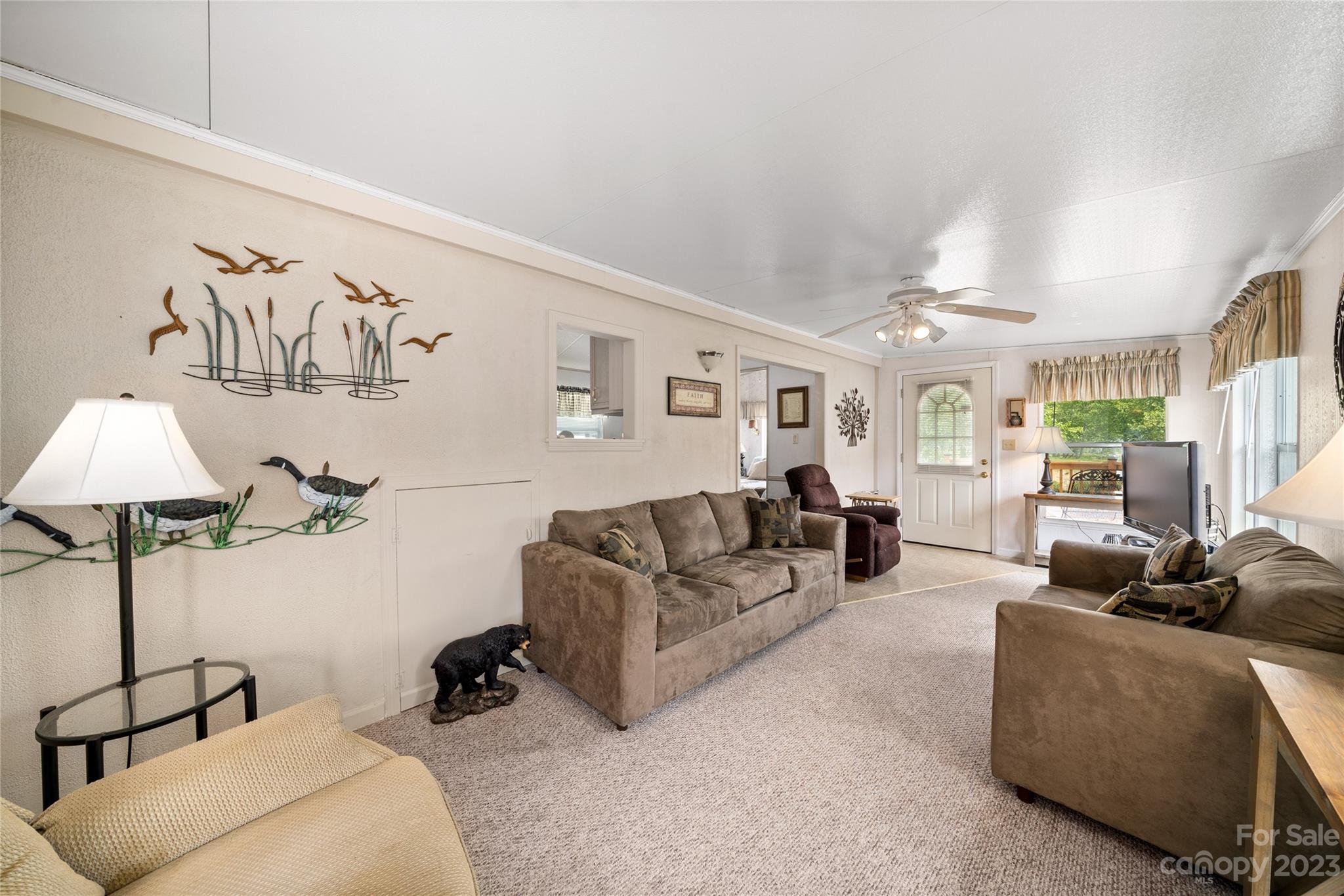 230 Pike Point Waynesville, NC 28785 - Photo 7 of 30 a living room with furniture and a large window