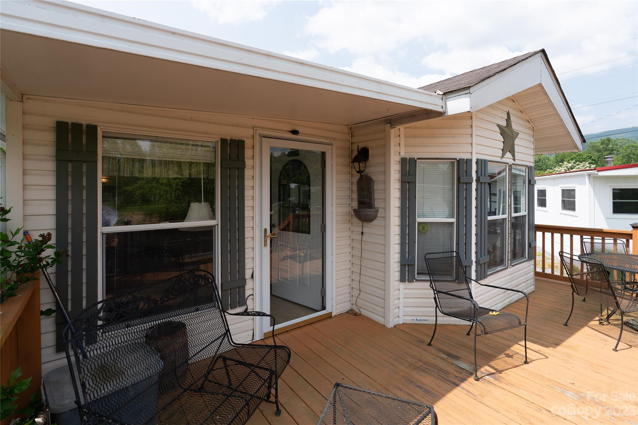230 Pike Point Waynesville, NC 28785 - Photo 10 of 30 a outdoor space with a glass door shower and yard