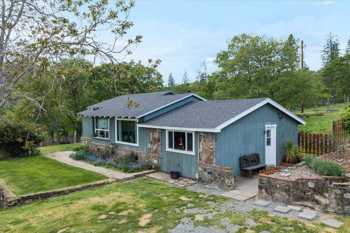 1360 Oxyoke Road Grants Pass, OR 97526 - Photo 4 of 39 a view of a house with a yard