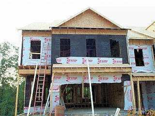 7226 Summit Waters Lane Raleigh, NC 27613 - Photo 1 of 1 a view of building with large windows