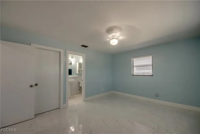 a view of a workspace with furniture