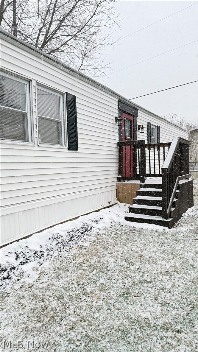 18592 Edwards Road, Unit 94 Doylestown, OH 44230 - Photo 17 of 17 View of snow covered property entrance