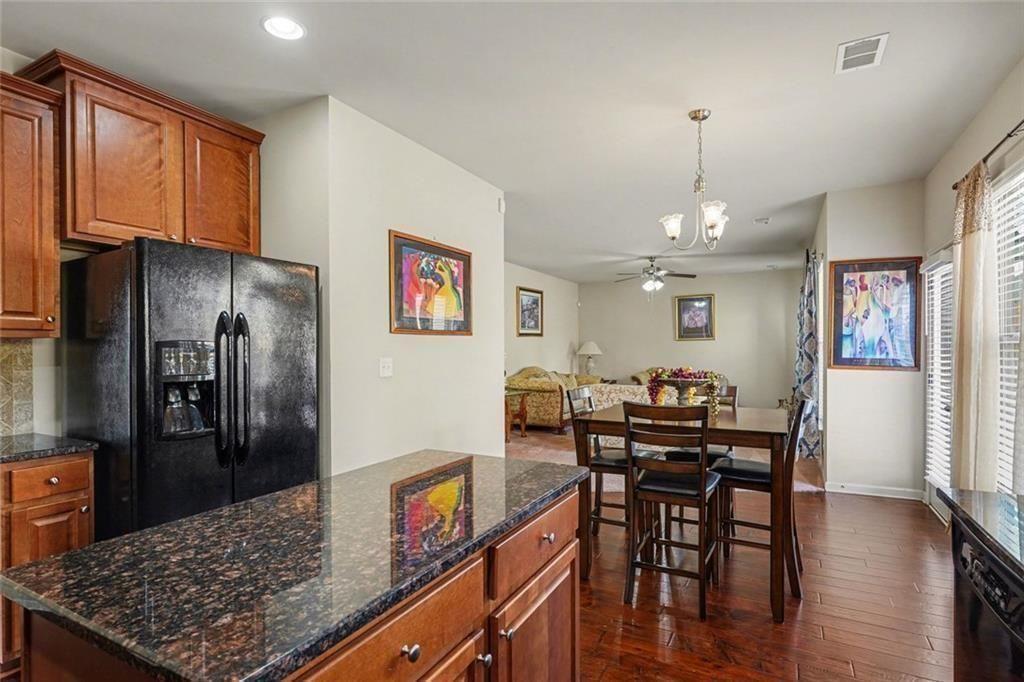 12155 Centerra Drive Hampton, GA 30228 - Photo 13 of 31 a view of a dining room with furniture