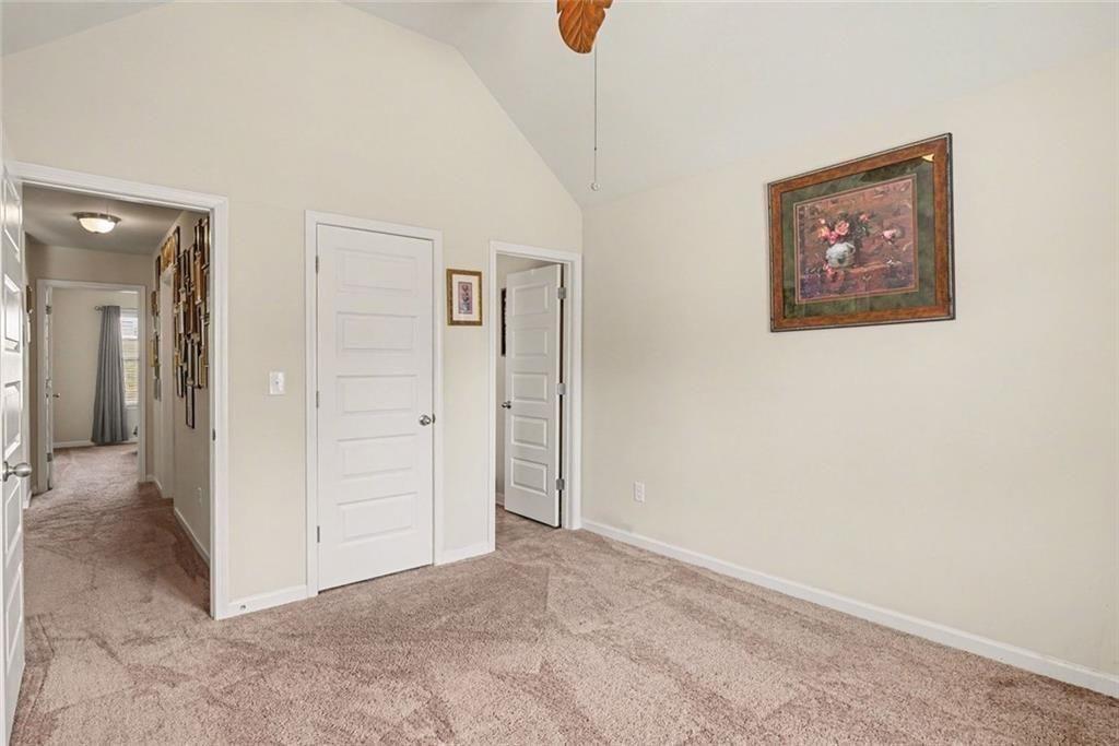 12155 Centerra Drive Hampton, GA 30228 - Photo 19 of 31 an empty room with cabinet