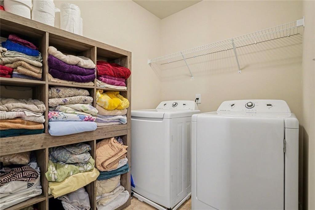 12155 Centerra Drive Hampton, GA 30228 - Photo 23 of 31 a utility room with dryer and washer