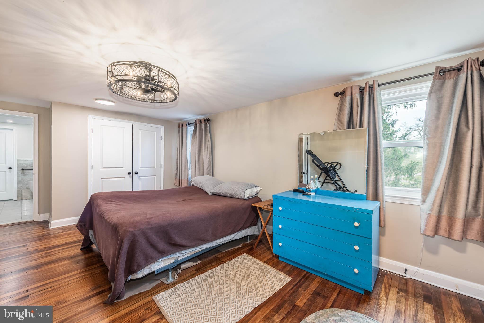 2705 Spring Hill Road Pikesville, MD 21208 - Photo 15 of 43 a bedroom with a bed and a window