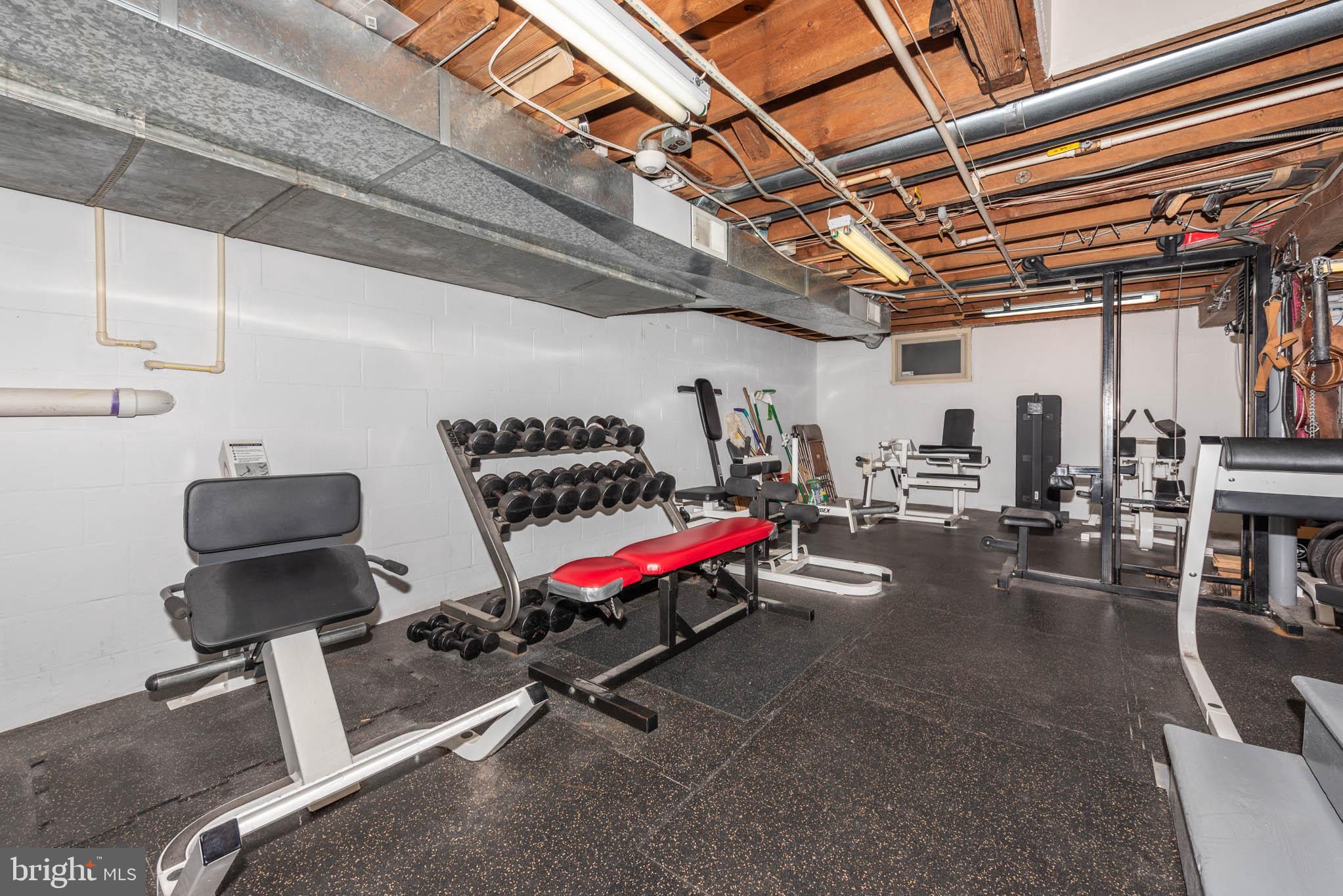 2705 Spring Hill Road Pikesville, MD 21208 - Photo 26 of 43 a view of a room with gym equipment
