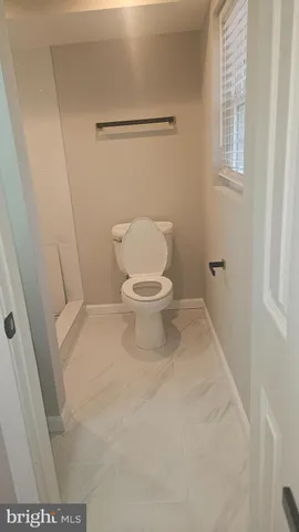 a bathroom with a window