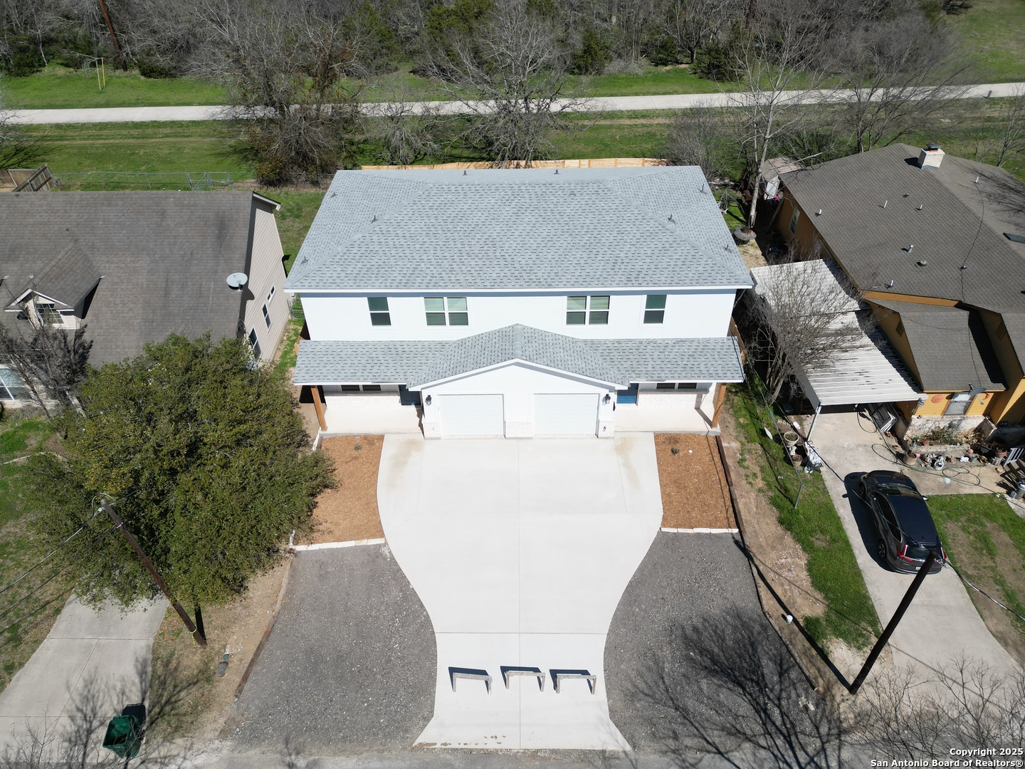 327 Ebner Street, Unit B Boerne, TX 78006 - Photo 3 of 21 an aerial view of a house with a yard