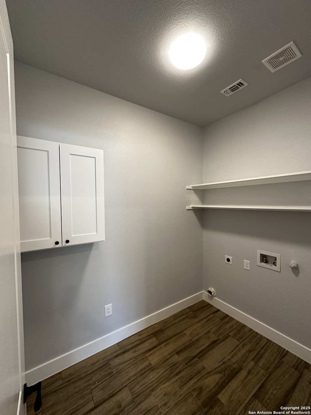 327 Ebner Street, Unit B Boerne, TX 78006 - Photo 8 of 21 a view of an empty room