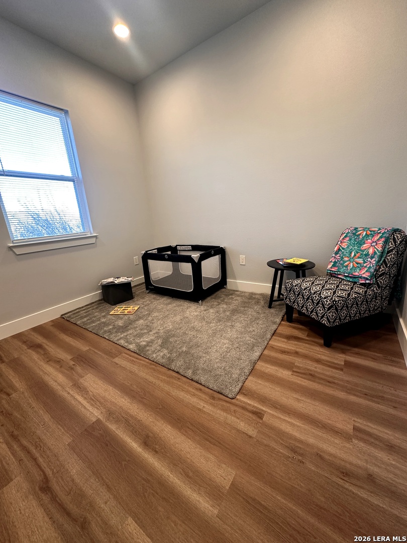 327 Ebner Street, Unit B Boerne, TX 78006 - Photo 10 of 21 a bedroom with a bed and a window