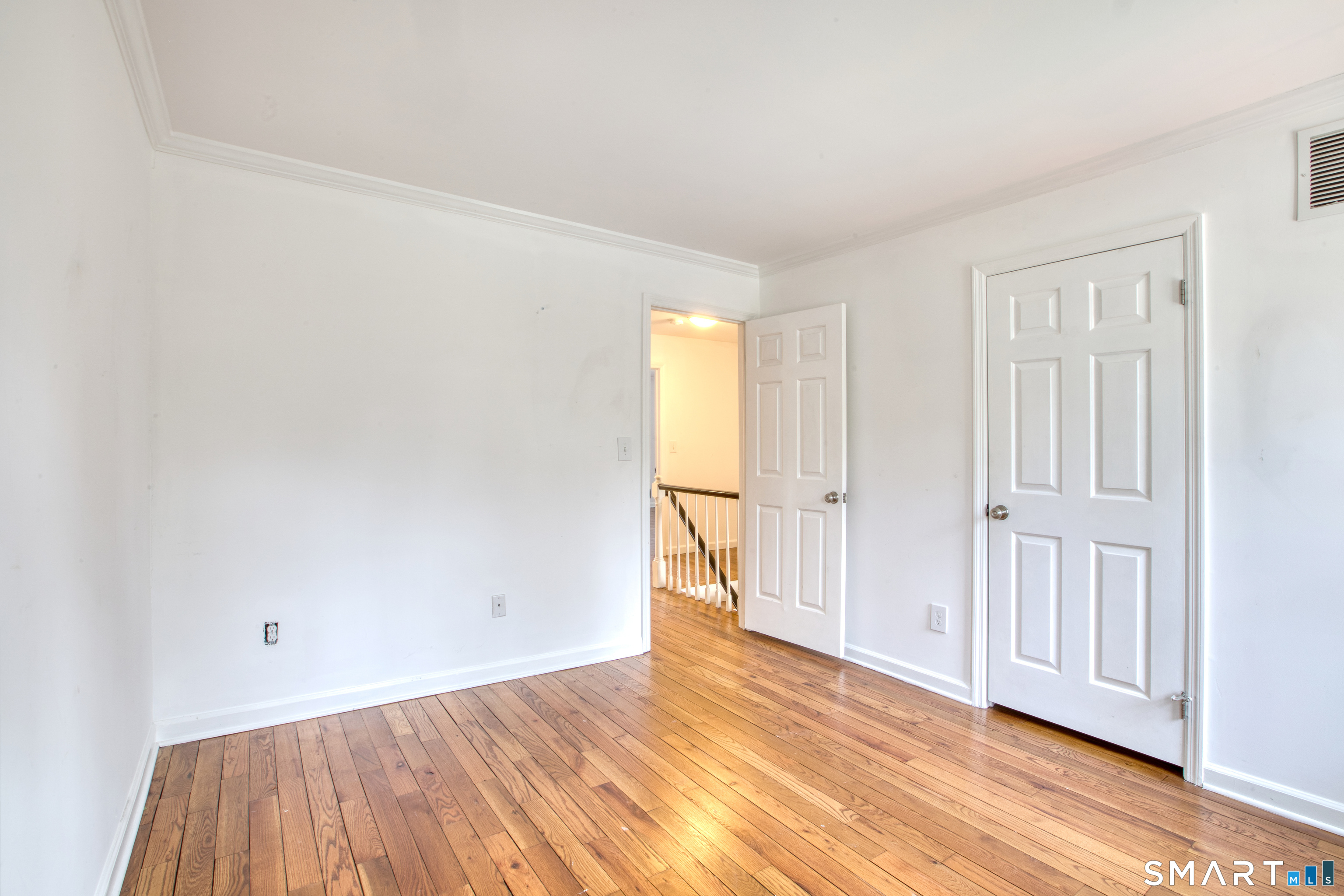9 Georgetowne North Greenwich, CT 06831 - Photo 25 of 35 wooden floor in an empty room