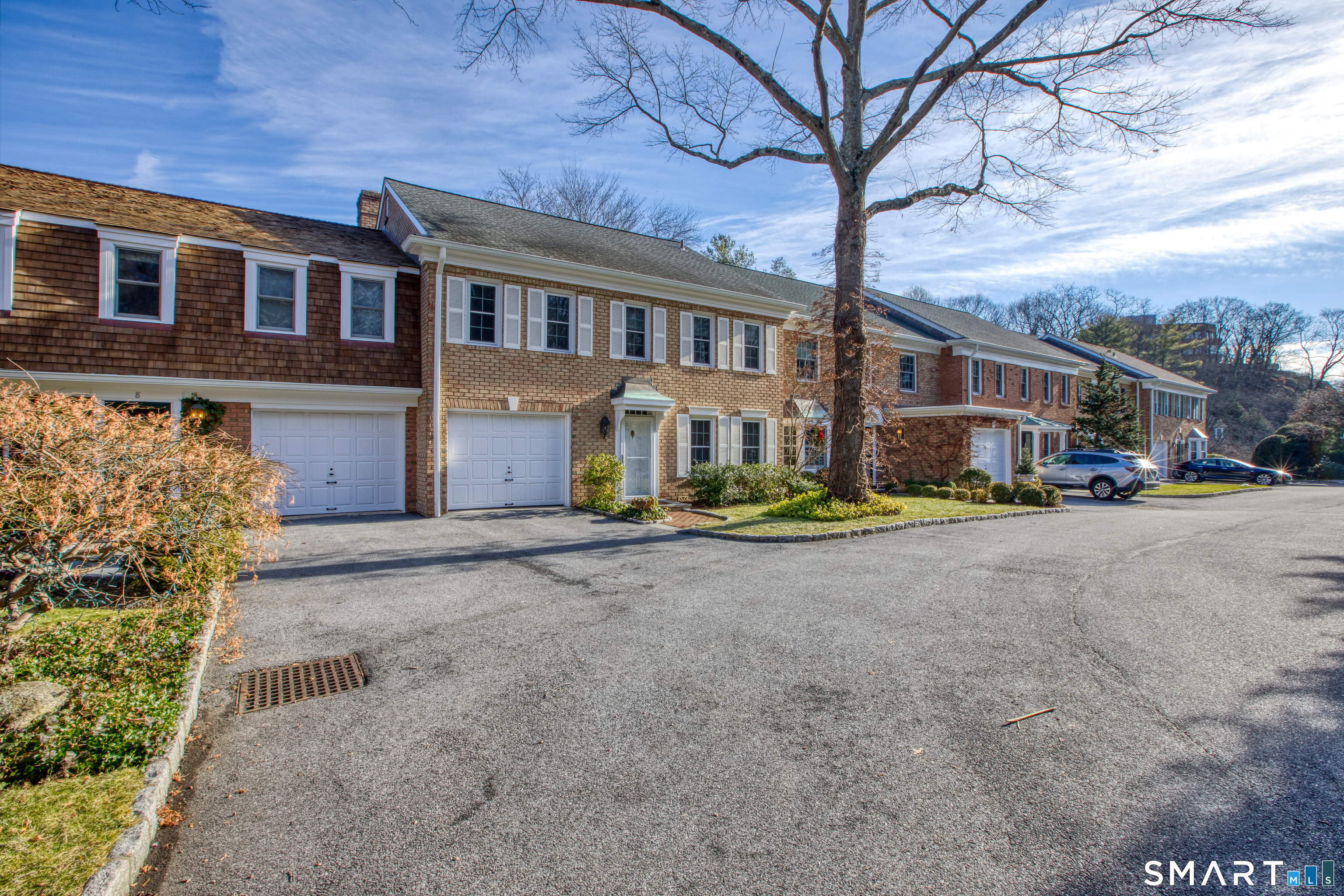 9 Georgetowne North Greenwich, CT 06831 - Photo 7 of 35 a view of a street with houses