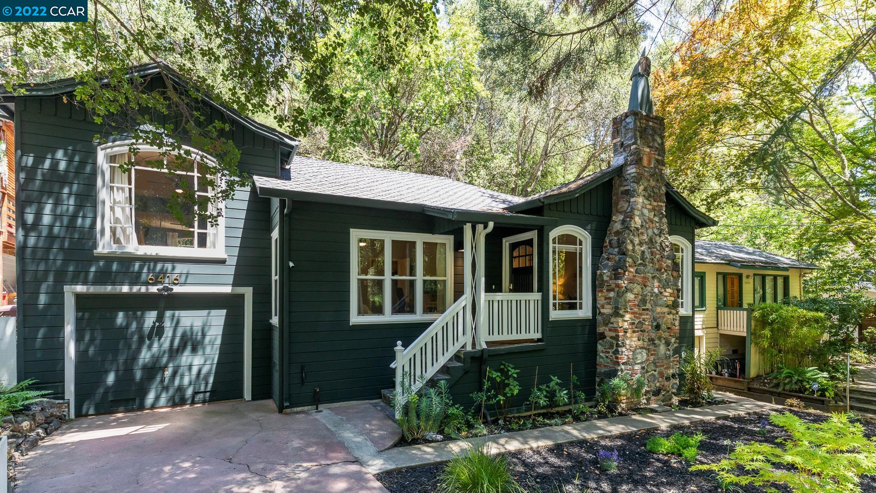 6416 Pinehaven Road Oakland, CA 94611 - Photo 1 of 1 a front view of a house with garden