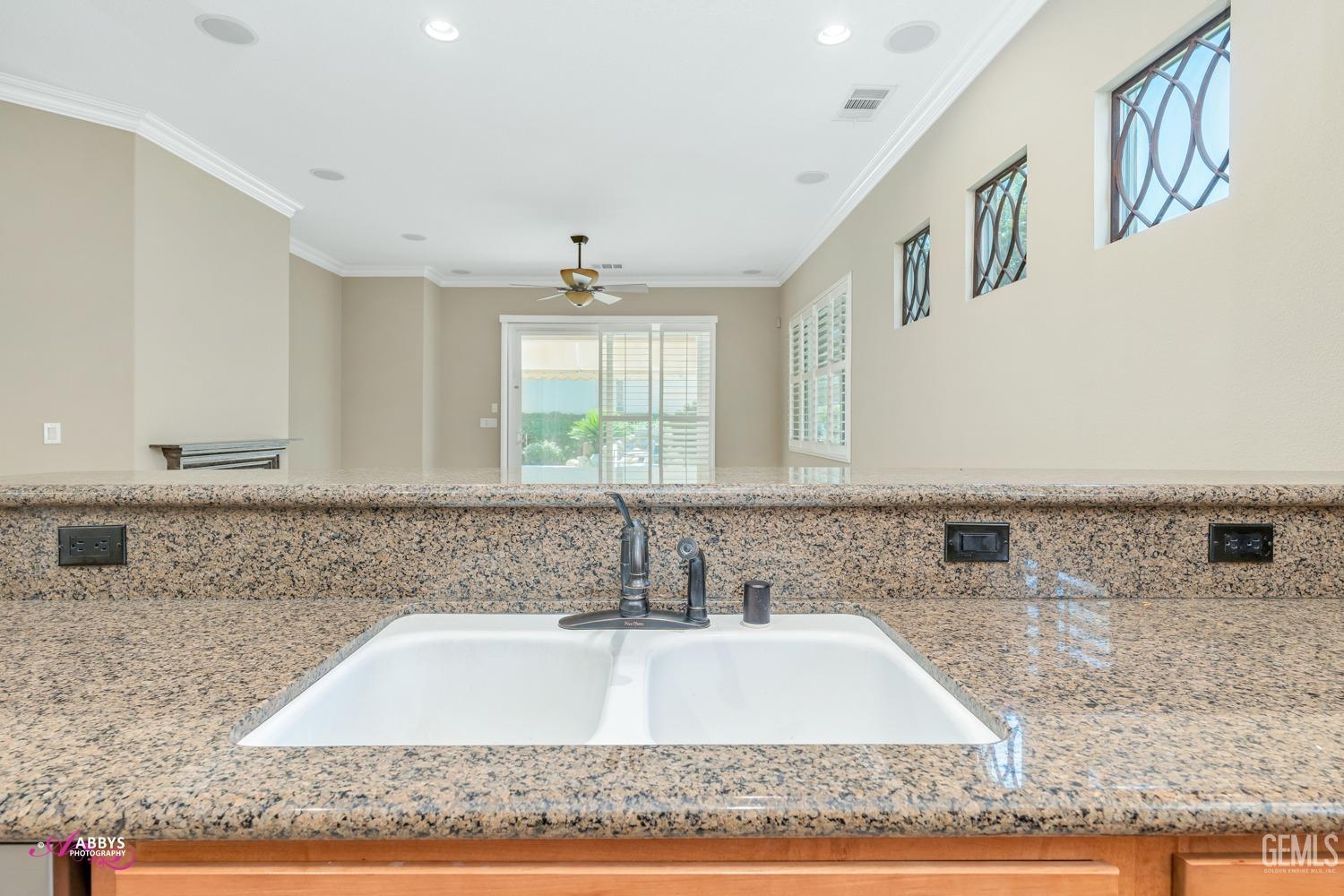 Undisclosed Address Bakersfield, CA 93306 - Photo 13 of 49 a bathroom with a bathtub sink and window