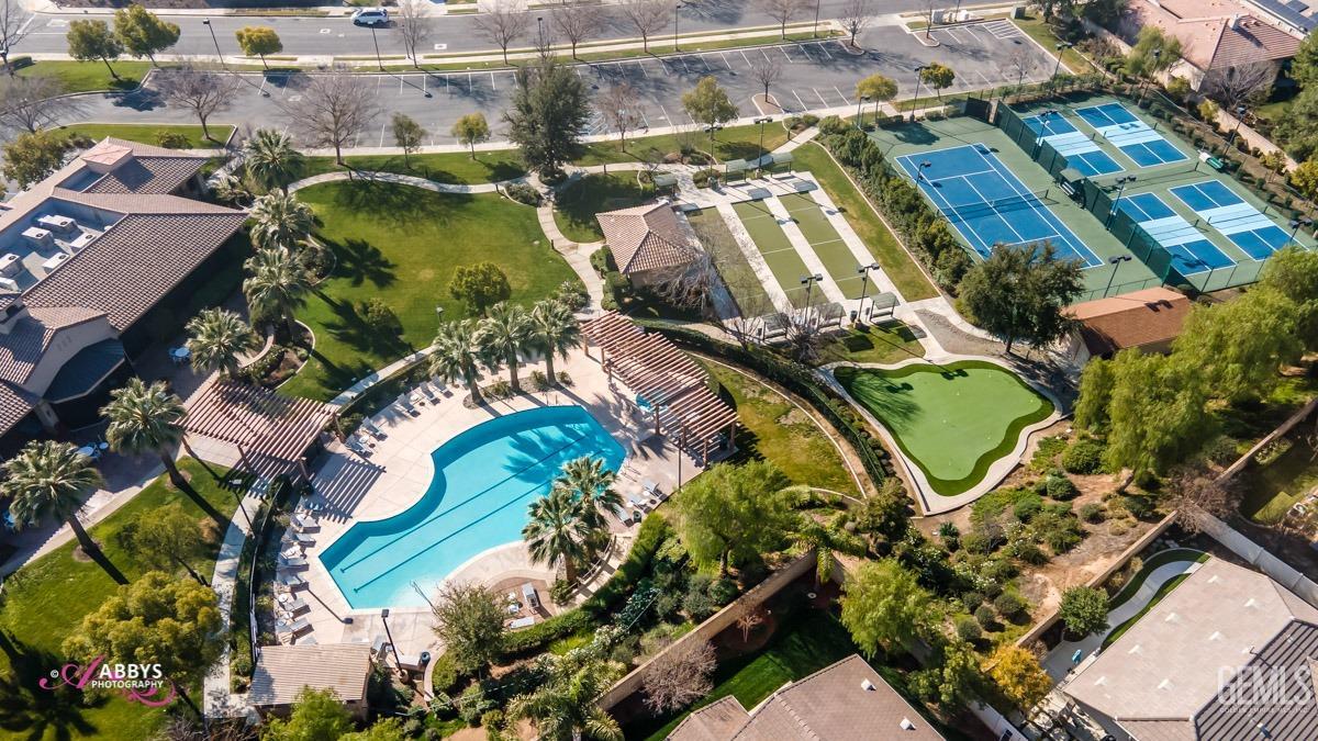 Undisclosed Address Bakersfield, CA 93306 - Photo 49 of 49 an aerial view of a house with a yard