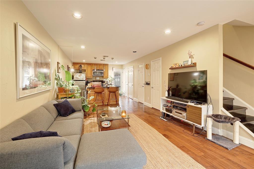 1911 Lightsey Road, Unit C Austin, TX 78704 - Photo 15 of 23 a living room with furniture and a flat screen tv