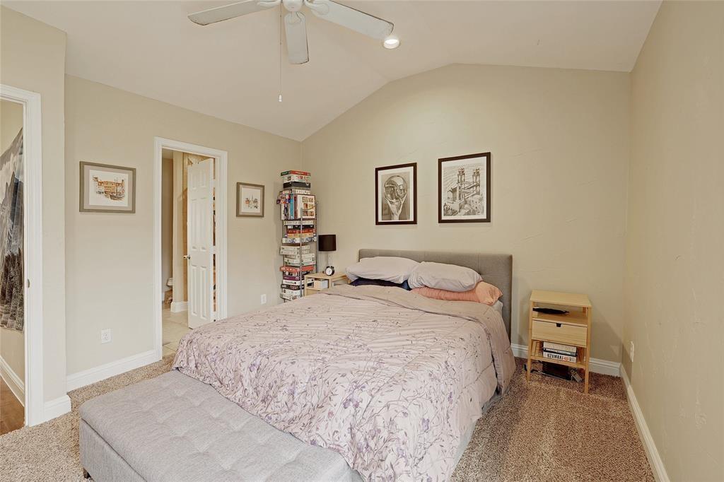 1911 Lightsey Road, Unit C Austin, TX 78704 - Photo 17 of 23 a bedroom with a bed and a cabinets