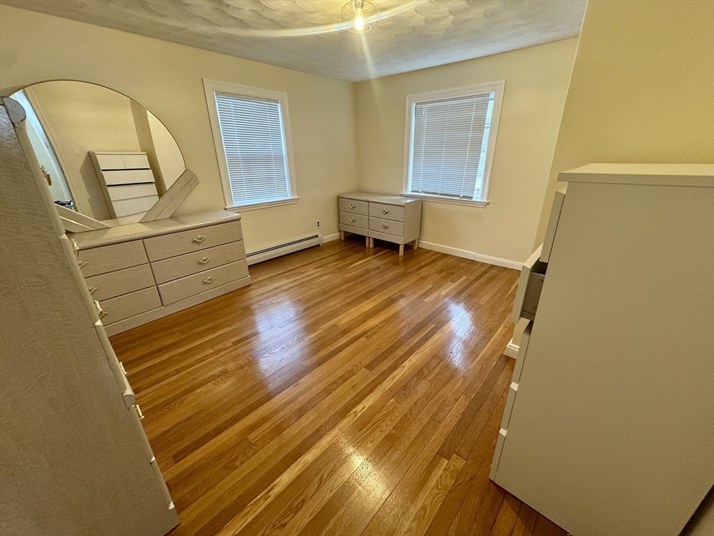 72 Redlands Road Boston, MA 02132 - Photo 20 of 31 a bathroom with a sink and mirror