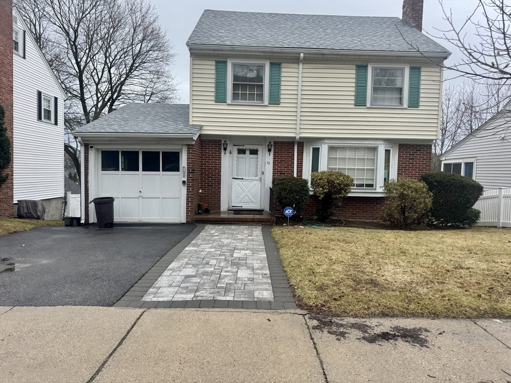 72 Redlands Road Boston, MA 02132 - Photo 2 of 31 a front view of a house with a yard