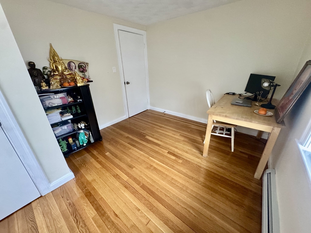 72 Redlands Road Boston, MA 02132 - Photo 23 of 31 a bed room with a bed and a tv