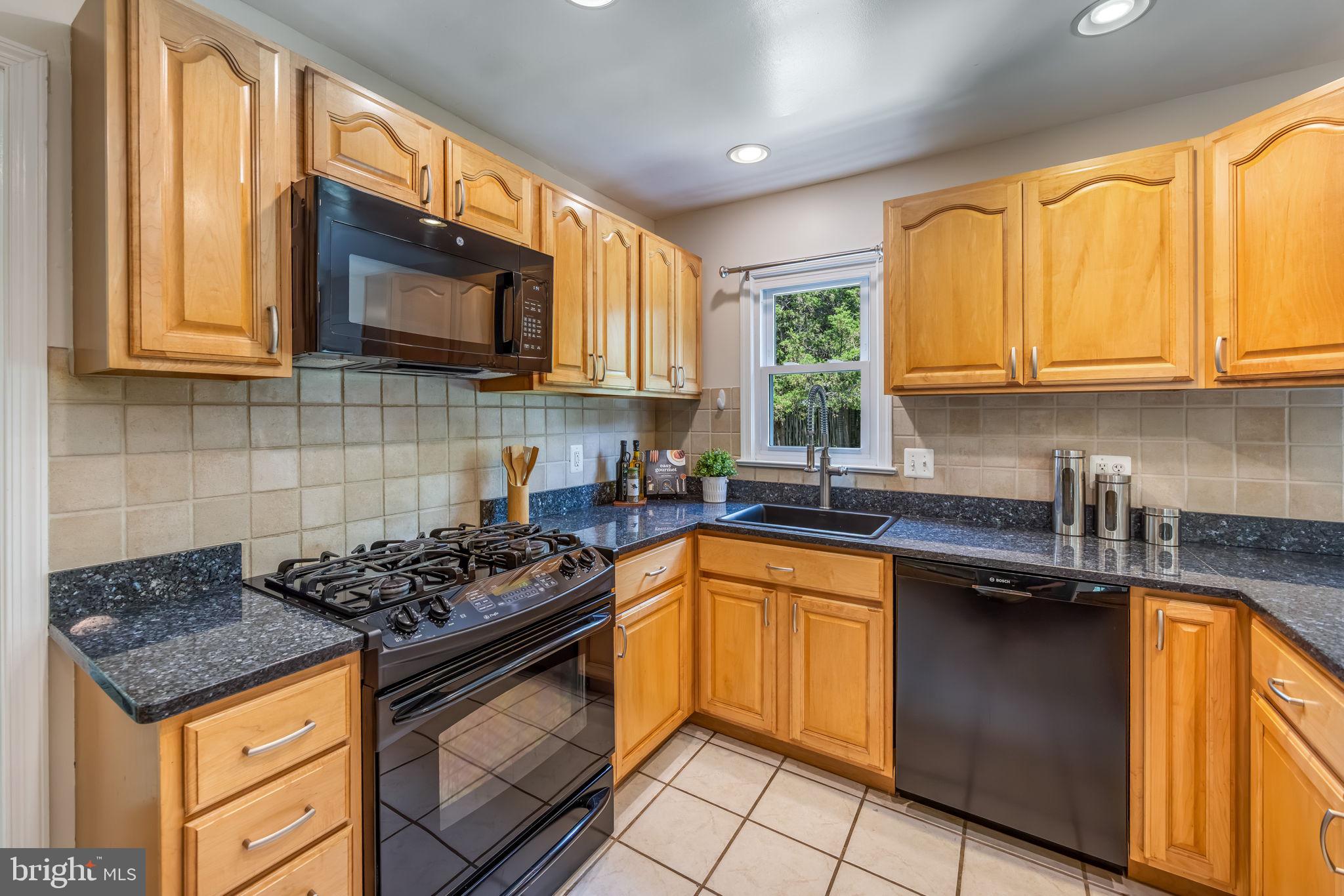 7808 Braemar Way Springfield, VA 22153 - Photo 17 of 47 Updated eat-in Kitchen with breakfast bar